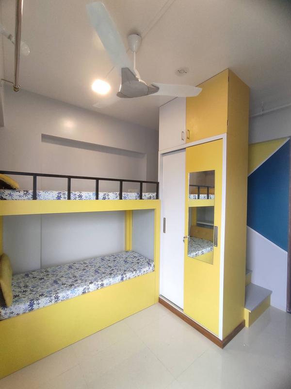 kids bedroom design by ss interior &landscape. we enjoy that process of work. This best kids bedroom theme of grey, white, yellow.#bestkidsbedroom #bestwordrobe #besttheamofcolours #bestdesign #bestbunkbed #lotofstorage #studytable