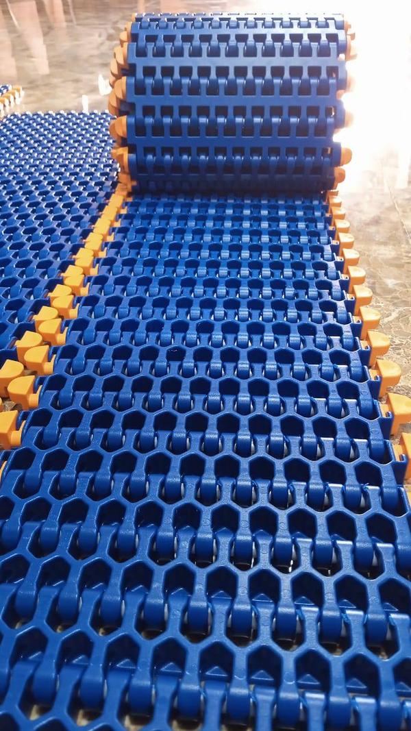 Side flex curve type plastic modular conveyor belt used in applications where there is need for products to turn in different directions. The product is available in PP and Acetal which can be used based on product weight and wear 