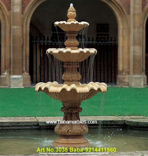 The Jodhpur Sand Stone Fountain is a stunning and captivating piece of architectural and artistic craftsmanship that embodies the rich heritage of Jodhpur, a city celebrated for its traditional stone work in India. Carved from the region's famed sandstone, this fountain is a magnificent example of the city's expertise in stonework. The intricately designed fountain features a combination of traditional and contemporary motifs, all intricately etched into the stone. Water gracefully flows from the fountain, creating a soothing and visually appealing display. The natural hues and textures of the sandstone give the fountain a warm and earthy character, making it a perfect addition to gardens, courtyards, or even indoor spaces. This Jodhpur Sand Stone Fountain not only serves as a functional water feature but also serves as a work of art that reflects the timeless beauty and cultural significance of Jodhpur's stone craftsmanship. It adds an elegant touch of tradition and serenity to any environment, making it a remarkable centerpiece that captures the essence of Jodhpur's heritage.