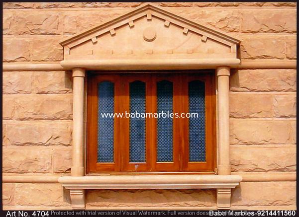A Jodhpur Sandstone Window is a remarkable architectural feature that embodies the rich cultural heritage and intricate craftsmanship of Jodhpur, a city located in the vibrant state of Rajasthan, India. These windows are meticulously carved from the renowned Jodhpur sandstone, prized for its warm and earthy tones. What sets these windows apart is their detailed and ornate design, often featuring intricate lattice work, delicate floral patterns, and traditional Rajasthani motifs. Beyond their aesthetic appeal, Jodhpur Sandstone Windows serve a functional purpose, allowing for natural light and ventilation while maintaining a sense of privacy. These windows are not only architectural elements but also works of art that enhance the beauty and character of the buildings they adorn. They stand as a testament to the city's rich cultural heritage and the enduring legacy of its skilled artisans, making them an iconic feature of Jodhpur's traditional architecture.