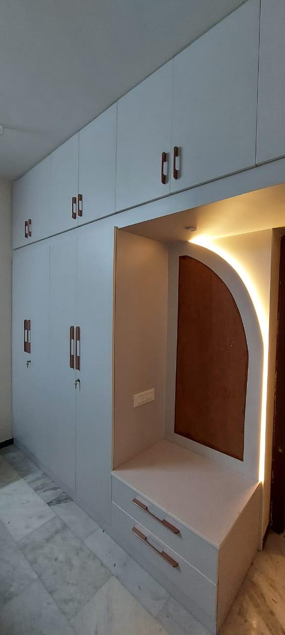 Coimbatore WardrobeClassy and trendy wardrobes transform a bedroom in addition to give ample storage facilities. Where it fits better and what should be the size is often a matter to be discussed with a designer and decide. Next is the choice of color and finish to match with the theme of the bedroom. Below are some of the samples of wardrobes we have done.