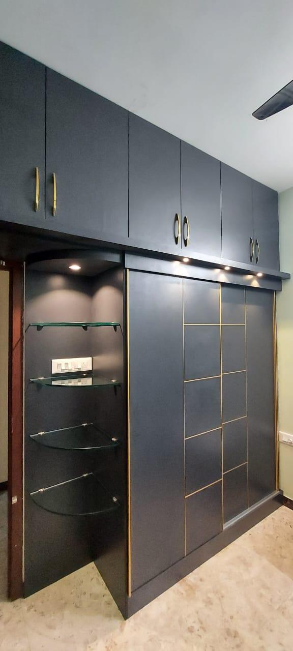 Coimbatore Wardrobe sliding doors can be used as room doors. In addition, it can be used as a room divider that can help to break up a large room or provide instant privacy in smaller spaces, like studio apartments or bedrooms. And We are the Most successful Sliding wardrobe manufacturers in Coimbatore.