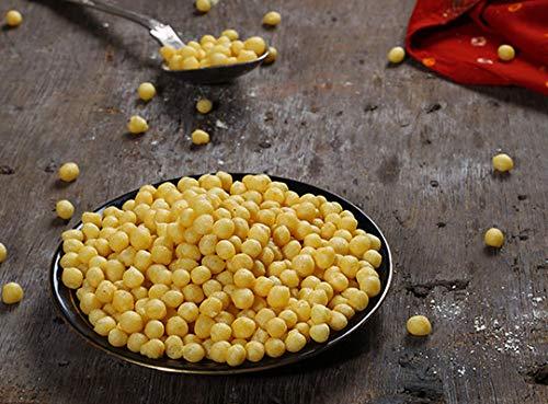 Fiki Bundi Namkeen is commonly used for making raita and various other dishes.  The ingredients used to make this namkeen include gram flour, oil, spices, and salt. The gram flour is mixed with oil and spices and then shaped into small balls. The balls are then deep-fried until they are golden and crunchy. It is highly applauded for its freshness, purity, crispiness and long shelf life. Also, it makes the raita more rich and tasty. Available in various packaging options, this Fiki Bundi Namkeen can be purchased from us at very reasonable rate.