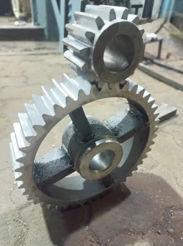 Gear Type	Spur GearUsage/Application	IndustrialHardness	ToughFinishing	PolishedI Deal In	New Onlysize	1-100Country of Origin	Made in India gear is a rotating circular machine part having cut teeth or, in the case of a cogwheel or gearwheel, inserted teeth (called cogs), which mesh with another (compatible) toothed part to transmit (convert) torque and speed. The basic principle behind the operation of gears is analogous to the basic principle of levers.[1] A gear may also be known informally as a cog. Geared devices can change the speed, torque, and direction of a power source. Gears of different sizes produce a change in torque, creating a mechanical advantage, through their gear ratio, and thus may be considered a simple machine. The rotational speeds, and the torques, of two meshing gears differ in proportion to their diameters. The teeth on the two meshing gears all have the same shape.