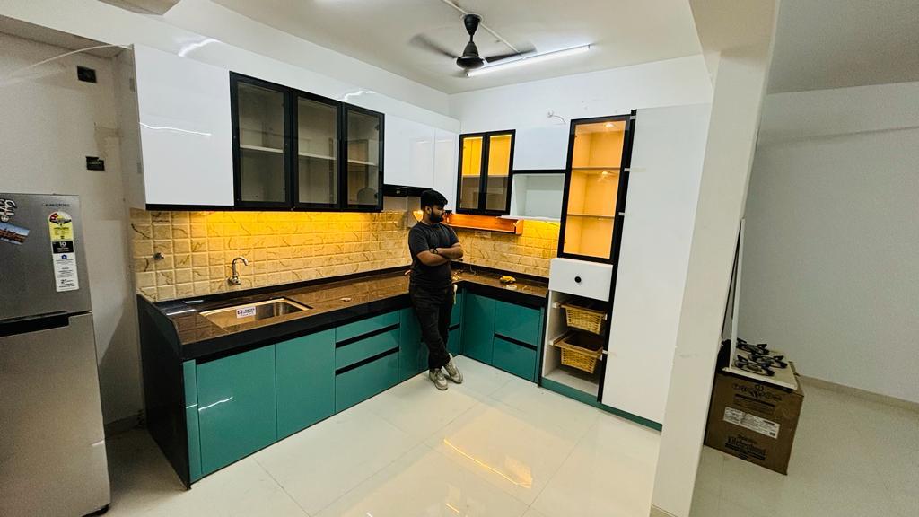 Introducing SOBO Furniture's Modular Kitchen Collection – where innovation meets functionality to redefine the heart of your home. Our commitment to excellence in design and craftsmanship extends seamlessly into our modular kitchen solutions, creating spaces that not only inspire but also elevate your culinary experience.**Sleek and Stylish Design:**Our modular kitchens boast sleek and stylish designs, reflecting contemporary trends while maintaining timeless elegance. Each element is carefully curated to provide a seamless blend of form and function, creating a kitchen that is not only visually appealing but also incredibly practical.**Customization for Every Lifestyle:**At SOBO Furniture, we understand that every home is unique, and so are the needs of its residents. Our modular kitchen collection offers a high level of customization, allowing you to choose from a variety of layouts, finishes, and accessories. Whether you prefer a minimalist design or a more elaborate one, we tailor our modular kitchens to suit your lifestyle and preferences.**Quality Materials and Durability:**Quality is paramount in our modular kitchens. We source materials with precision, ensuring durability and resilience against the rigors of daily use. From high-quality cabinetry to robust countertops and fixtures, every component is crafted to stand the test of time, maintaining its aesthetic appeal and functionality for years to come.**Innovative Storage Solutions:**Maximize your kitchen space with our innovative storage solutions. Our modular kitchens feature cleverly designed cabinets, drawers, and organizers to ensure efficient utilization of every inch. Say goodbye to clutter and experience the joy of a well-organized kitchen that enhances your cooking experience.**Cutting-Edge Technology:**Embrace the future of kitchen design with our incorporation of cutting-edge technology. From smart appliances to innovative lighting solutions, our modular kitchens seamlessly integrate technology to make your cooking and dining experience not only convenient but also enjoyable.**Expert Installation and After-Sales Service:**SOBO Furniture takes pride in providing a holistic service. Our team of experts ensures the seamless installation of your modular kitchen, paying attention to every detail. Additionally, our commitment extends beyond the sale – we offer excellent after-sales service to address any queries or concerns, ensuring your satisfaction with our product.Transform your kitchen into a culinary haven with SOBO Furniture's Modular Kitchen Collection. Experience the perfect amalgamation of style, functionality, and innovation as we redefine the way you interact with this vital space in your home. Welcome to a new era of kitchen design with SOBO Furniture – where your culinary dreams come to life.