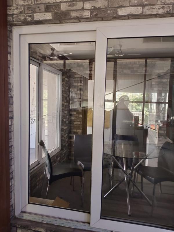 The 3 Track Aluminium Window with Mosquito Net is a versatile and functional window system designed to provide a seamless blend of aesthetics, functionality, and practicality.Material and Construction:The window frame is crafted from high-quality aluminum, a material known for its durability, corrosion resistance, and lightweight properties. The 3 Track design allows for the incorporation of multiple sliding tracks, providing flexibility in opening and closing the window panels.Design and Aesthetics:The window is designed with a modern and sleek aesthetic, complementing various architectural styles. The clean lines and smooth finish contribute to the overall visual appeal of the product. The aluminum frame can be powder-coated in a range of colors, allowing customization to match or contrast with the building's exterior.Functionality:The 3 Track design enables the window to accommodate three separate sliding tracks, allowing for different configurations. This flexibility allows users to control the level of ventilation and light entering the space. The smooth sliding mechanism ensures easy operation, enhancing user convenience.Insect Protection:An integrated mosquito net is a standout feature of this window system. The netting is designed to effectively keep insects, mosquitoes, and other unwanted pests outside while allowing fresh air to circulate freely. This feature is especially valuable in regions where insect-borne diseases are a concern.Energy Efficiency:The window system is designed to contribute to energy efficiency in the building. Double-glazed glass panels may be incorporated to enhance insulation, reducing heat transfer and improving the overall energy performance of the structure.Security Features:Security is a top priority, and the window system is equipped with robust locking mechanisms. This ensures the safety of the occupants by preventing unauthorized access and enhancing overall security.Customization Options:To cater to diverse architectural preferences, the 3 Track Aluminium Window with Mosquito Net offers customization options. Clients can choose from various sizes, configurations, and finishes to meet specific project requirements.Easy Installation and Maintenance:The window system is designed for straightforward installation, making it suitable for both new constructions and renovation projects. Additionally, the low-maintenance requirements of the aluminum frame contribute to the long-term durability of the product.