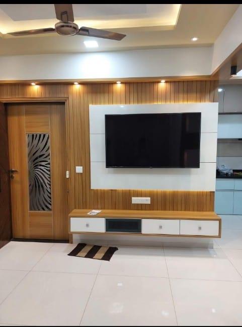Shree Chamunda Modular Kitchen & Home Interior is a manufacturer of modular furniture who also provides TV wall units in Katraj and near by areas. You can certainly check for these television units so that you can enjoy the experience of watching television with family.Discover our versatile modular TV units, crafted to redefine your entertainment space. Our customizable furniture allows you to create a personalized setup tailored to your preferences. With sleek designs, ample storage, and adaptable configurations, our modular units seamlessly blend style and functionality. Elevate your home entertainment experience with our modern, space-saving solutions. Explore the possibilities and transform your living area into a haven of sophistication and organization. TV Unit in Katraj, Pune.