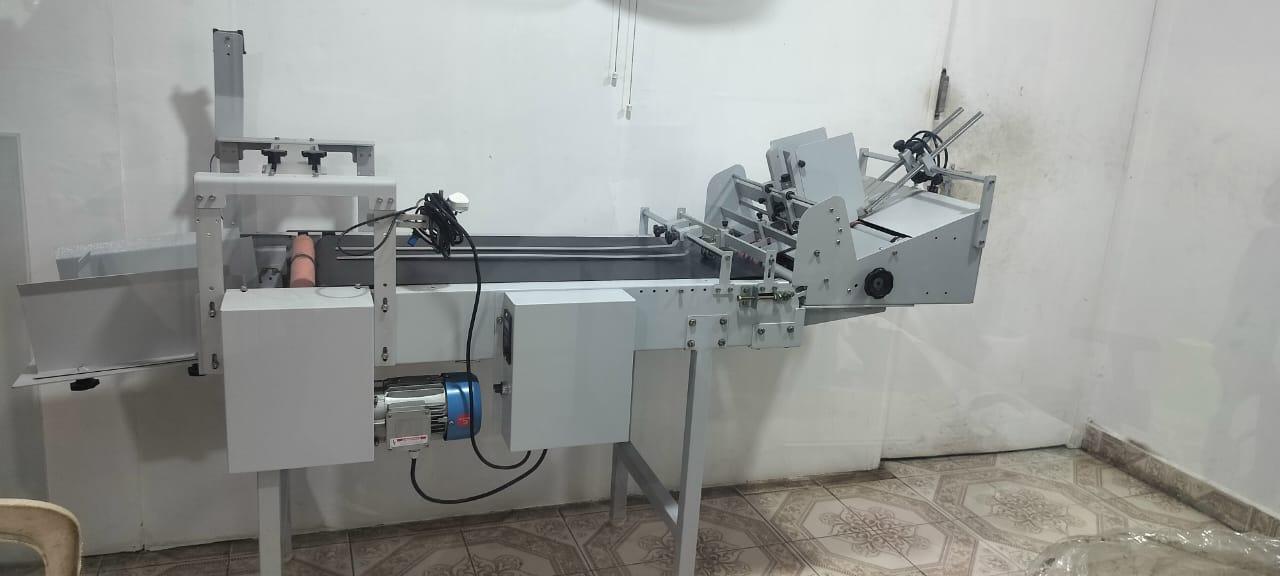 AutoFeeder Conveyor with TTO, Suitable for Preformed Pouches. Very good performance. Speed 60-80 Pouches per minute. Suitable for TTO