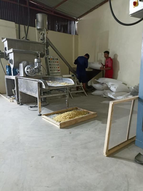 AC Motor : 60 HP.(Make: CG/ABB)Capacity : 900 - 1000 kg/h.Gear Box : Make: Premium. A C Geared motor : 5 HP for hopper.A C Motor : 5 HP For vacuum pump.A C Geared Motor : 3 HP for Transfer.A C Geared Motor : 1 HP for cutter.M O C : Painted Mild Steel.Cooling System : Yes. Water coolingElectric supply : 415 V 50 Hz 4 wireElectric control panel fully automatic.Main motor speed variable.Cutter motor speed variable.Temperature controller automatic.All motor & Gear box Reputed company.With 3 dies (Macaroni, Fusilli Pasta, Vermicelli)