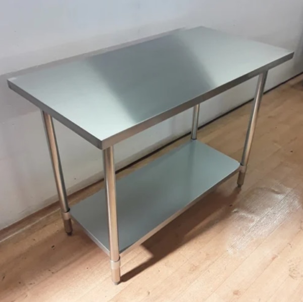 Material	Stainless SteelUsage/Application	Hotel And RestaurantStorage Details	YesSurface Finish	PolishedColor	SilverDesign Type	StandardNumber Of Legs	4 LegsTable Size	3 FeetWe are engaged in offering a wide range of  quality Products to our clients. Our range of all products is widely appreciated by our clients.