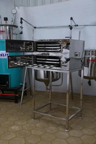 Idli SteamerOther Details:This unit contains a chamber.This is mounted on SS stand.Racks will be provided underneath to keep idli plates.Idli is boiled within 5 to 7 minutes.Heat resistant door with auto steam injection.