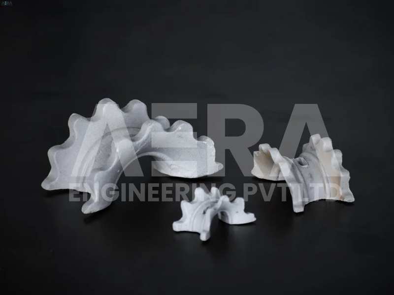 AERA CERAMIC SUPER SADDLES equivalent to are a specific type of structured packing material widely used in various industrial applications, including distillation, absorption, and stripping processes. They are an enhanced version of the traditional ceramic saddles, designed to provide improved performance in terms of mass transfer and separation efficiency.AERA CERAMIC SUPER SADDLES have a unique geometric shape resembling a hollow cylinder with multiple internal and external fins. These fins increase the surface area of the saddles, allowing for enhanced contact between the liquid and gas phases within the column. The increased surface area promotes better mass transfer, leading to improved separation and purification of the process streams.The internal and external fins of AERA CERAMIC SUPER SADDLES provide several benefits. The internal fins create a tortuous path for the liquid flow, effectively spreading and redistributing the liquid film across the surface of the saddles. This promotes more intimate contact between the liquid and gas phases, enhancing mass transfer efficiency. The external fins help to distribute the gas phase evenly, reducing pressure drop and optimizing the flow characteristics within the column.Like traditional ceramic saddles, AERA CERAMIC SUPER SADDLES are made from high-quality ceramic materials, such as porcelain or alumina, which offer excellent chemical resistance, high-temperature stability, and mechanical strength. These properties make them suitable for applications involving corrosive or aggressive process streams and elevated operating temperatures.