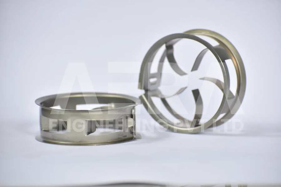 AERA Mini Rings equivalent to Cascade Mini Rings are advanced mass transfer packing elements that offer superior performance and increased capacity in various industrial applications. These uniquely designed cylindrical rings feature a series of internal and external fins, creating a highly efficient surface area for enhanced gas-liquid contact and improved mass transfer efficiency.Crafted from high-quality materials, AERA Mini Rings exhibit excellent resistance to chemical corrosion, ensuring durability and long-term performance in harsh operating conditions. The intricate design of the rings promotes uniform liquid distribution, minimizing pressure drop and maximizing mass transfer rates.AERA Mini Rings are known for their ability to handle high liquid and gas loads, making them ideal for applications such as distillation, absorption, and scrubbing. Their enhanced capacity allows for increased throughput and improved separation efficiency, resulting in optimized process performance.By choosing AERA Mini Rings, you can benefit from their advanced design and exceptional mass transfer efficiency, empowering your industrial processes and achieving superior results. Experience the advantages of AERA Mini Rings and elevate your mass transfer operations to new levels of efficiency and productivity.