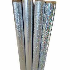 Holographic thermal lamination film is a type of lamination film that combines the protective properties of traditional thermal lamination with holographic effects. It's commonly used in the printing and packaging industry to add visual appeal and enhance the aesthetic value of various materials such as documents, labels, packaging, and promotional items.The film is typically made of several layers, including a base layer for adhesion, a holographic layer that creates the visual effects, and a heat-activated adhesive layer. During the lamination process, the film is applied to the surface of the material using heat and pressure, creating a durable and visually striking finish.The holographic effects can vary widely, ranging from simple patterns and designs to intricate and multi-dimensional images that shimmer and change appearance when viewed from different angles. These effects can help products stand out on the shelf, attract attention, and communicate brand identity or message effectively.In addition to its decorative properties, holographic thermal lamination film also offers protection against moisture, abrasion, and other forms of damage, helping to prolong the life and quality of the laminated material. This makes it a popular choice for applications where both aesthetics and durability are important considerations