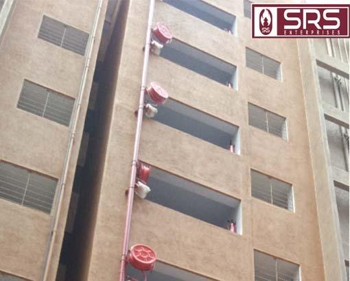 DOWN COMER FIRE HYDRANT SYSTEM IN COIMBATOREDown comer Hydrant system is used in the places where tank is located in the upper most floor. A vertical pipe carries the water from the tank to the landing valves located at each floor. Water will be always maintained at a certain pressure inside the long pipe. An inlet will be provided at the front of a premise to connect the fire brigade when there is a lack of water supply. Fire Fighting hose will be fitted to the valve for splashing water in order to eliminate fire. Applied at the areas where tank is placed at the top most floors.