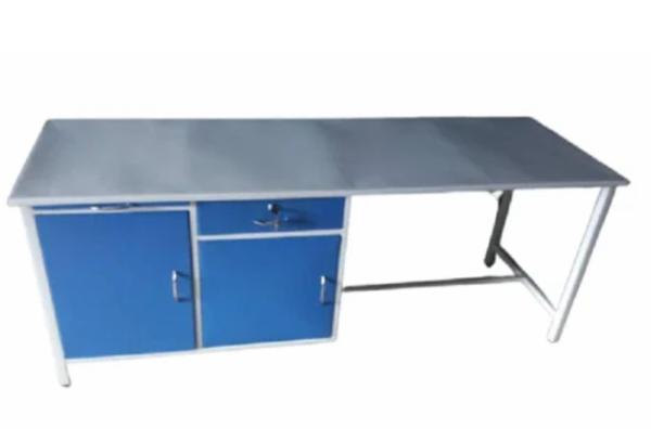 Double storage examination table:-Two cabinet one drawer.Sturdy base frame.One slider for BP apparatus.Pre treated and Epoxy powder coated3