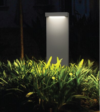A decorative LED bollards designed with double sided light output to provide soft,flat beam light distribution.These luminaries offer shielded glare free illumination on ground surface and are perfect for illuminating entrances,footpaths as well as garden and landscape architecture.Clean Lines and pure form are the underlying elements in this series of LED bollards.Product Benefits• High luminous efficiency at reduced wattage.• Elegant,Robust design.• Dark sky compliant protects pedestrians from glare by preventing spill light above the horizontal plane.• Sustainable LED technology offers durability and optimal light output with low power consumption.