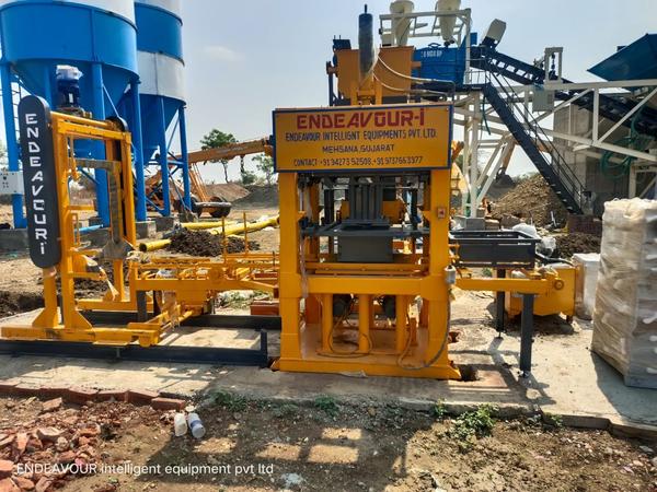 Hydraulic Vibro Compacting Concrete Blocks PlantMulti Product Machine to Produce Fly Ash Bricks, Cement Bricks, Concrete Solid Blocks, Concrete Hollow Blocks, Concrete Paver Blocks, Concrete Paver Blocks with Color Face etc…Model: ENDEAVOUR-iC1800Production Capacity: 8 Bricks per Stroke / 1200-1800 Bricks per HourStandard Bricks Size: 230 X 110 X 75 mm (Size Options Available)Vibration: Oil Filled Box Type High Speed Vibration Controlled by VFDPan Mixer Capacity: 600 Kgs per Batch – 1 MixerHydraulic Tank Capacity: 250 LtrsControl Panel: User Friendly PLC Based Control Panel with Touch Screen DisplayPallet Size: 570 X 570 X 19 mmConnected Power: 26 HP / 19.5 KW / 3 Phase / 440 Volts / 50 HtzDetails & Specifications are subjected to change without Prior Notice.Please Contact us for more details.Video Link: https://www.youtube.com/watch?v=34D0bUAmkmkMobile:+91-9427352508, +91-9737663977Concrete Block Plant, Concrete Block Machine, Concrete Block Making Plant, Concrete Block Making Machine, Automatic Concrete Block Plant, Automatic Concrete Block Machine, Automatic Concrete Block Making Plant, Automatic Concrete Block Making Machine, Concrete Blocks Plant, Concrete Blocks Machine, Concrete Blocks Making Plant, Concrete Blocks Making Machine, Automatic Concrete Blocks Plan,t Automatic Concrete Blocks Machine, Automatic Concrete Blocks Making Plant, Automatic Concrete Blocks Making Machine, Cement Block Plant, Cement Block Machine, Cement Block Making Plant, Cement Block Making Machine, Cement Concrete Block Plant, Cement Concrete Block Machine, Automatic Cement Block Making Plant, Automatic Cement Block Making Machine, Cement Blocks Plant, Cement Blocks Machine, Cement Blocks Making Plant, Cement Blocks Making Machine, Automatic Cement Blocks Plant, Automatic Cement Blocks Machine, Automatic Cement Blocks Making Plant, Automatic Cement Blocks Making Machine