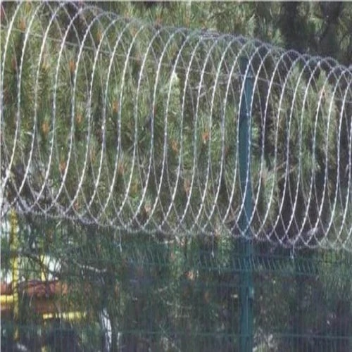 Coil Diameter	StandardMaterial	Galvanized IronBlade Thickness	0.5 mm - 0.6 mmUsage/Application	Security FencingRazor Type	Double Blade RazorCore Wire Thickness	2.5 mmConcertina wire or Dannert Wire is a type of barbed wire or razor wire that is formed in large coils which can be expanded like a concertina (a small hand-held bellows-type instrument in the same family as the accordion). In conjunction with plain barbed wire (and/or razor wire/tape) and steel pickets, it is most often used to form military-style wire obstacles. It is also used in non-military settings, such as when used in prison barriers, detention camps, riot control,