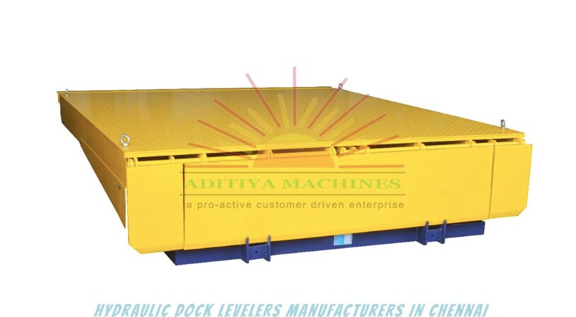 HYDRAULIC DOCK LEVELLER
This is a hydraulic height-adjustable platform between the factory or warehouse floor to truck/container bed height.

SPECIFICATION
• Load Capacity - 9000 Kg Point Load (16000 Kg Uniformly Distributed)

• Width - 2000mm

• Length - 2500 Mm /3000 Mm / 3500 Mm / 4000 Mm

• Pit Height - 550mm

• Height Adjustment Of Deck - +350 & -250mm

• Lip Dimension - 400 Mm X 2000 Mm

• Operation - 3 Phase AC Powerpack With Push-Button Controls

• Pit Dimension - 2000 Mm (W) X 2500 / 3000 / 3500 / 4000 Mm X Height 550 Mm

SALIENT AND SAFETY FEATURES
• Hose Burst Valve For Deck Cylinder

• 12VDC Solenoid Voltage, No Electric Shock

• Overload Protection For Electric Motor

• 2 Nos. Safety Prop-Up For Maintenance

• 1000 Mm Hydraulic Deck Lift For A Person To Go Inside Comfortably During Maintenance

• Self-Cleaning Lip Hinge System

• Radius Lip System
