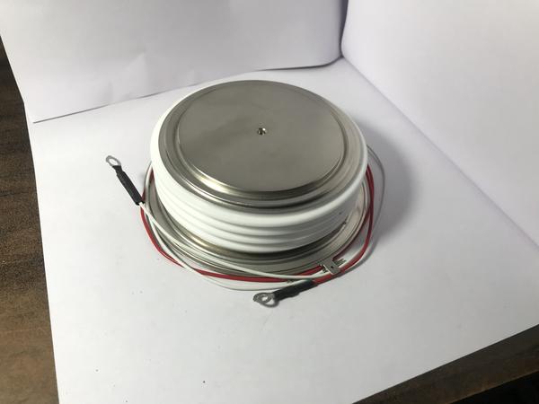 DCR3400V18 CAPSULE THYRISTOR(3400 Amp- 1800 V)Introducing the DCR3400V18 Capsule Thyristor, offered by SAS Power Semiconductor Devices. This high-capacity thyristor is engineered for optimal performance in demanding industrial applications. With a current rating of 3400A and a voltage rating of 1800V, it is ideal for phase control, power conversion, and motor drives. The DCR3400V18 features advanced semiconductor technology and a robust capsule design, ensuring efficient, reliable, and durable operation. SAS Power's commitment to quality guarantees long-term stability and consistent performance. Enhance your power control systems with the superior efficiency and dependability of the DCR3400V18 Capsule Thyristor from SAS Power Semiconductor Devices.We 