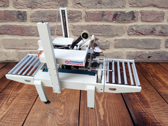 This is box Tapping machine in this top and bottom side can do tapping 