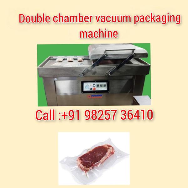 Double chamber vacuum packaging machine for meat