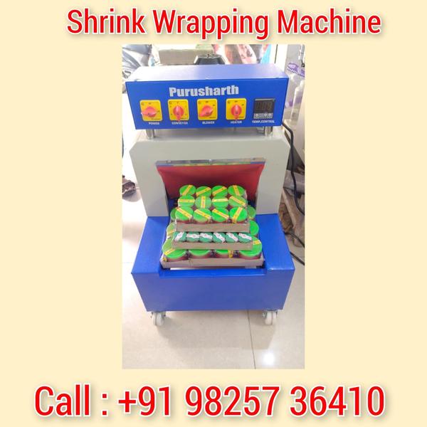 Shrink wrapping packing machine