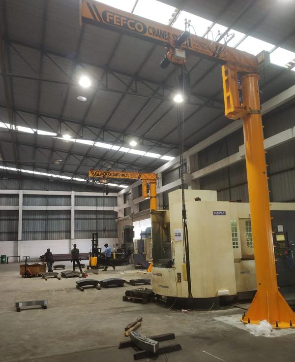 Fefco offer base mounted, free standing jib cranes.  This units are engineered and designed for floor mounting.  Units rotate 360 degrees and 180 degree and are available in a variety of capacity, height and span. The booms conform to ISO standards and have removable end stops for rapid trolley installation.Product Features1) Heavy-duty assembly with reinforcing side plates2) Full plate style gussets for maximum load distribution.3) Heavy-duty top thrust bearing with pressure fitted housing for ease of rotation.4) Heavy-duty roller cage that is built to last with steel rollers with low friction bearings, adjustable tension bolts, keeper bar and zerk fittings.5) Anti-tip angles to prevent head removal from accidental impact.6) Spacer rods to prevent head assembly plate flexing.