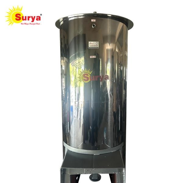 Why SURYA WOOD FIRED HOT WATER Boiler? Advanced water heating system with lowest fuel consumptions. It is affordable and suitable for Domestic purpose, Resorts, Hotels, Hospitals, Hostels, Dairy farms, Poultry farms and etc. In terms of recurring running cost, it is cheaper than any other systems. Most European countries adopt this system.• Modern Storage type water Heater.• Hot Water in just 10 Minutes & Multi floor hot water connection.• Retains heat for 8-10 hrs. also, suitable for hard water.• It works on Wood, Charcoal, Coconut shah, kernels and Agricultural waste.• Rust proof coating & 5 Years Warranty.• No Electricity save your Money. Quality Life of Surya Boiler is up to 15 years. The raw materials used in the boiler is acquired from high quality raw materials supplier like JSW, Jindal and etc. Life span of the Boiler depends on the quality of raw materials used. The Boiler is designed in a way to use only minimum Wood and time to heat. SURYA Wood Fired Boiler stands out for exceptional quality.Accessories• Stand• Gray drawer• Fire bar• Door• Chimney• Temperature gauge• Spring type enclosed safety valves• User manual & Warranty Card Technical DetailsModel : 1000L • Top circle : 6mm • Outer tank : 5mm • Inner tank : 12mm • Diameter : 48inch • Height : 12feet • Fuel Req.: 55kg @max load • Total weight : 850kg • Inlet pipe : 2.6 inch • Outlet pipe : 2.6 inch • Air vent 3/4 inch Drainage :1.6 inch • Place required : 4x4feet • Exhaust pipe : 10feetHow to maintain Boiler for more life span?• Always Keep Boiler dry• Don’t place your Shampoo, Soap, detergents and etc. on the top of boiler. • Plumbing connection has to be done Without leaking.• Don’t use plastic.• Do not fit non return valve (NRV) • Clean the Ash properly.Dirty, Rusty or Smelly WaterIf your water is smelling off, it is always an indicator of some kind of bacteria growth. You will need to flush your tank.More Time & FuelIt is almost always an indicator of some kind of Dust blockage. Your will need to clean Boiler Exhaust pipe.Why Wood fired water heater is best over other systems? • Wood-fired water heater runs regardless of the weather, whereas a solar water heater cannot run on overcast, wet, or foggy days. • When hard water is present, wood-fired water heaters perform best; solar water heaters are not appropriate for hard water.• Wood-fired water heater is more affordable than an electric one. Operating cost of electric water is high.• Wood Fired water heater helps in muscle relaxation & recovery, relief from headache, improved sleep, reduces body pain and relief stress.