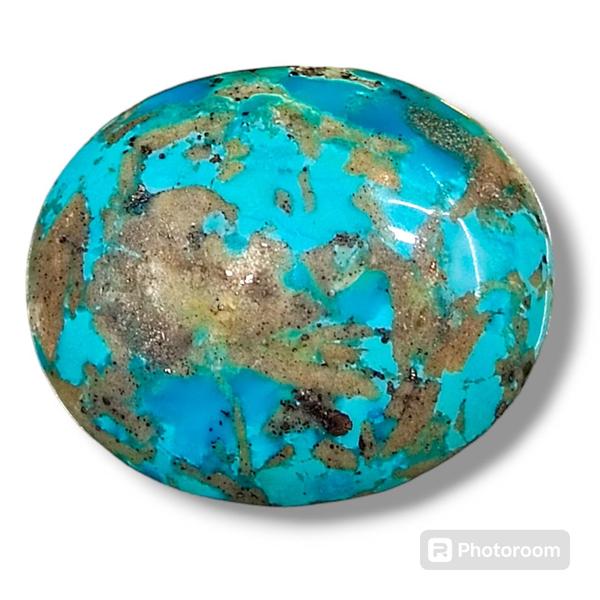 I have natural Irani Turquoise (Firoja) at my shop for wholesale! The size of this piece is 28.25 carats. This stone is incredibly rare and valuable, and it's perfect for use as jewelry or for metaphysical purposes. Each piece is one-of-a-kind, so you won't find two that are exactly the same. If you’re a jewelry designer, you’ll love the colors and patterns of these stones. They’re also perfect for gemstone collectors. And I promise, you won’t find a better price anywhere else. So if you’re interested, please come to my shop today. I can’t wait to show you these beautiful stones.