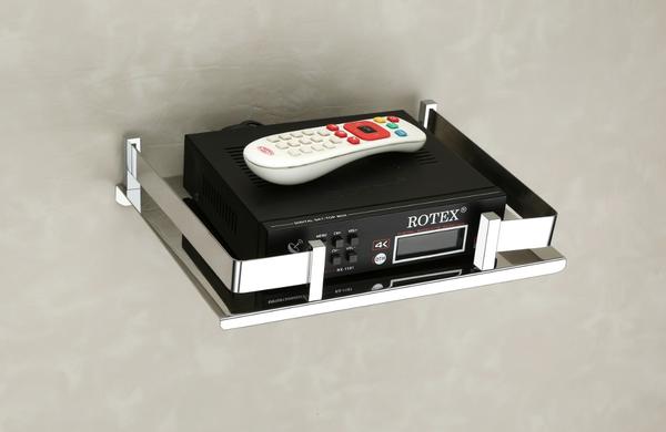 This elegant set-top box shelf is meticulously crafted from premium stainless steel, offering a robust and stylish solution for organizing your entertainment devices. Its sleek, polished surface and modern design make it an attractive addition to any room, while its sturdy construction ensures long-lasting durability. The shelf provides ample space for your set-top box, remote controls, and other small accessories, keeping them neatly organized and easily accessible. With its minimalist aesthetic and high-quality finish, this shelf seamlessly blends with any decor, enhancing the overall look of your space.