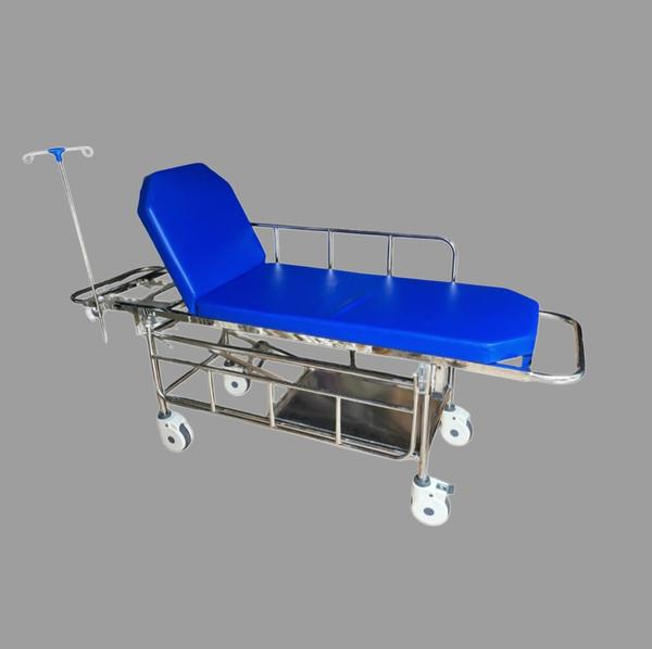 Specifications:-• Overall Approx Size: 180L X 56W X 81H cm • Frame work made of Tubular S. S. Pipe Swing Away type Safety Side Railing, Adjustable I. V. Rod Utility Tray, Cylinder Cage Foam padded top • Trolley mount on 15cm Dia castors - 2 with BrakesHospital Furniture Manufacturer in India/Gurgaon/Delhi NCRBest Medical furniture supplier/Manufacture in Gurgaon/Delhi NCRHospital Medical Equipments supplier/Manufacture in Gurgaon/Delhi NCR