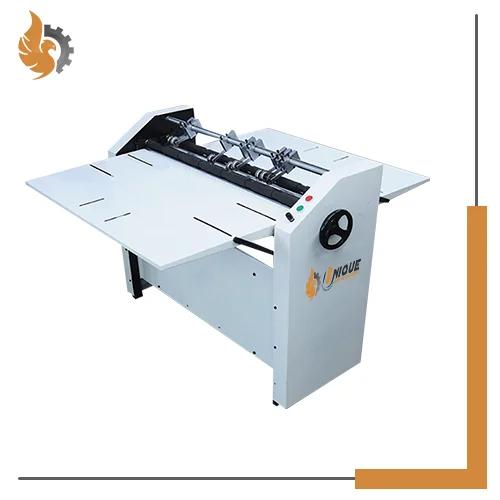 Roller Creasing Machine In CoimbatoreOur range of Roller Creasing Machines embodies cutting-edge technology and unmatched craftsmanship, ensuring seamless creasing operations. From 80 GSM to 450 GSM, our machines deliver consistent, precise creasing results, minimizing waste and maximizing efficiency.