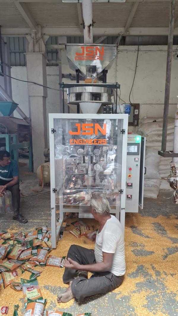 High Speed Collar Type Volumetric Cup Filler Machine for Pulses Pouch Packaging up to 2 Kg.