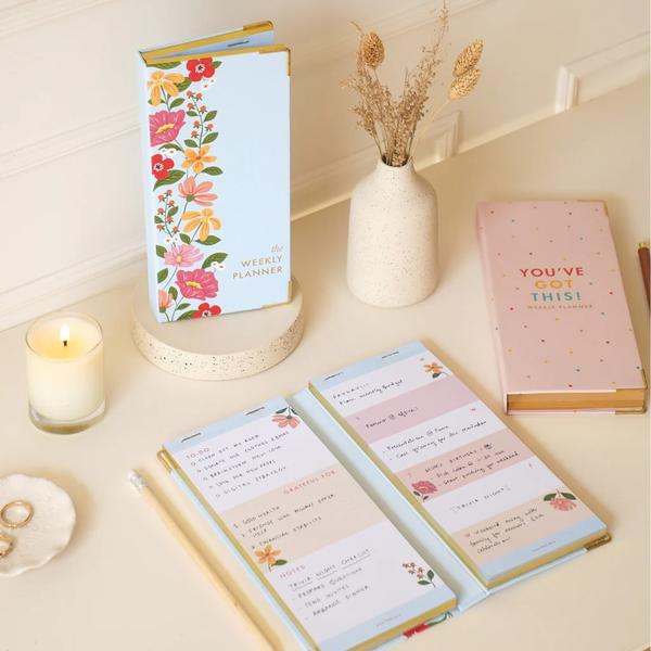 Our easy-to-carry weekly pocket planner, helps you structure your Monday to Sunday plans effectively. Its weekly rows will help you document your daily tasks and to-dos. View your entire week at a glance, a must-have work essential.This undated weekly planner comes with 60 tear-off pages on each side, so you are sorted for an entire year plus a few more weeks. These hardbound planners come with gold foiling details, edge gilding, and metal corners to protect the planner corners.60 tear-off pages of lovely paper on each sideCreative cover designs Weekly overview to plan and schedule your weekAmple space to write your tasksWeekly to-do list