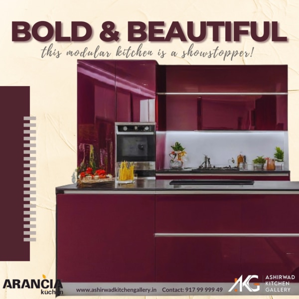 Bold and beautiful, this modular kitchen is a true showstopper! The vibrant purple cabinets create a stunning focal point, and their high-gloss finish adds a touch of glamour. The sleek stainless steel appliances complement the bold color scheme perfectly, creating a kitchen that is both modern and elegant. With its ample storage space and well-designed layout, this modular kitchen is as functional as it is stylish. It's the perfect place to cook up culinary masterpieces and entertain friends and family.