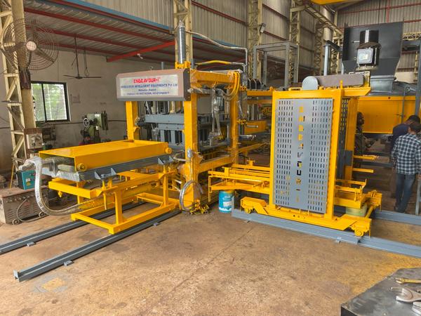 Hydraulic Vibro Compacting Concrete Blocks PlantMulti Product Machine to Produce Fly Ash Bricks, Cement Bricks, Concrete Solid Blocks, Concrete Hollow Blocks, Concrete Paver Blocks, Concrete Paver Blocks with Color Face etc…Model: ENDEAVOUR-iC3500Production Capacity: 18 Bricks per Stroke / 2500-3500 Bricks per HourStandard Bricks Size: 230 X 110 X 75 mm (Size Options Available)Vibration: Oil Filled Box Type High Speed Vibration Controlled by VFDPan Mixer Capacity: 1500 Kgs per BatchHydraulic Tank Capacity: 400 LtrsControl Panel: User Friendly PLC Based Control Panel with Touch Screen DisplayPallet Size: 830 X 830 X 32 mmConnected Power: 100.00 HP / 75.00 KW / 3 Phase / 440 Volts / 50 HtzDetails & Specifications are subjected to change without Prior Notice.Endeavour Intelligent Equipments Private Limited is Leading Manufacturer of Concrete Blocks Plant, Cement Blocks Plant, Concrete Blocks Machine, Cement Blocks Machine, Concrete Blocks Making Plant, Cement Blocks Making Plant, Concrete Blocks Making Machine, Cement Blocks Making Machine, Concrete Block Plant, Cement Block Plant, Concrete Block Machine, Cement Block Machine, Concrete Block Making Plant, Cement Block Making Plant, Concrete Block Making Machine, Cement Block Making Machine, Automatic Concrete Blocks Plant, Automatic Cement Blocks Plant, Automatic Concrete Blocks Machine, Automatic Cement Blocks Machine, Automatic Concrete Blocks Making Plant, Automatic Cement Blocks Making Plant, Automatic Concrete Blocks Making Machine, Automatic Cement Blocks Making Machine, Automatic Concrete Block Plant, Automatic Cement Block Plant, Automatic Concrete Block Machine, Automatic Cement Block Machine, Automatic Concrete Block Making Plant, Automatic Cement Block Making Plant, Automatic Concrete Block Making Machine, Automatic Cement Block Making Machine