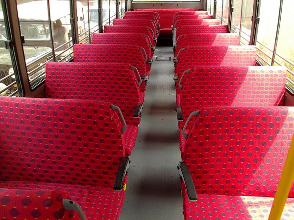 Which place on the bus is the best place to sit? Sitting in the front of the bus is usually the best place to sit on a long-distance bus. This is because they provide ample leg room and reclining options, as well as access to air conditioning and other amenities.