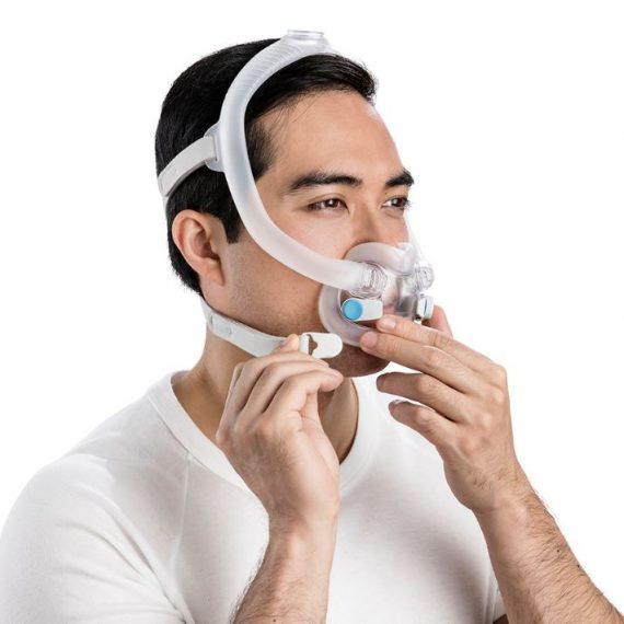 AirFit is a minimal-contact full face mask, designed for all sleeping positions. Designed with two magnetic clips to slip your mask on and off with ease. The under-the-nose cushion gives you the freedom to relax and watch a show before bed, by giving you a wider frame of vision. While the mouth cover delivers consistent humidity and comfort for mouth breathers. ResMed AirFit  full face mask features a comfortable UltraCompact cushion and top-of-head tube connection,1 so you have the freedom to sleep in many positions. Thanks to the under-the-nose cushion, red marks and discomfort on your nasal bridge are a thing of the past. Specially-designed to fit all patients, regardless of facial profile. Designed to perform across a wide range of therapy pressures. Modular frame fits all cushion sizes. This new cushion features specially-designed “infinity” loops and varying thickness levels designed to reduce blowout and provide support at the sides of the nose.