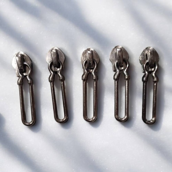 Product DescriptionWith very long years of experience in this realm, we are engaged in proffering world class array of zinc 3 Zipper Slider. They are handy and available in many size options. Features: Sturdy and durableResistant to breakageCan withstand high impactMetal finishedMany sizes availablePerfect finishFrom our new collection, we are offering our clients an astonishing collection of zippers,brass zippers fibre zippers,etc. The optimum quality raw material is procured from the reliable vendors of the market to manufacture these zippers in adherence with set industry standards and norms. We offer these zippers in various designs, shapes, sizes and colors to meet the variegated requirements of our respected customers. Our products are widely demanded for high strength and durability.