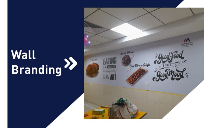 Wall branding is a way to use walls and other surfaces to advertise a brand and create a unique brand image: Brand identityWall branding can help communicate a company's brand identity, including its logo, tagline, and visual design. Visual impactWalls are a large, visible canvas that can capture attention and make a space more inviting. Inspire actionWall graphics can create an atmosphere that inspires people to think and take action. Fast processingHumans process visual information more quickly and efficiently than written information. Here are some tips for wall branding:Use wall graphics and murals to tell a story in a large space. Customize the approach to meet the client's needs. Use graphics, photographs, and digital arts to create unique and personalized ambiances. Print business-related content to stick on glass and other flat surfaces.