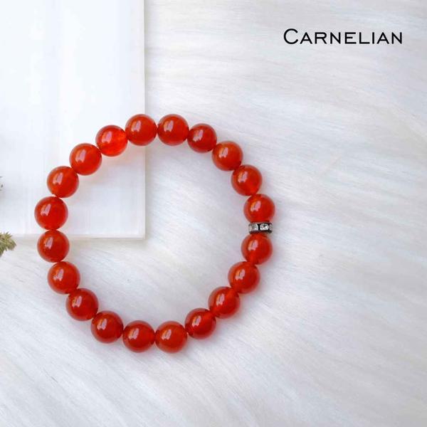 Carnelian is also believed to attract prosperity, new resources, and good luck. It is associated with the end of summer or the beginning of autumn. You can integrate the energy of carnelian into your daily life by wearing it as jewelry. You could fasten a piece to a necklace or bracelet, find a pair of carnelian earrings, or keep it in your pocket.Emotional: Banishes emotional negativity, brings positive energy, energizes the lower chakras, helps to overcome depression, promotes love of life, brings joy, enhances creativity, promotes courageLucky: Boosts self-esteem, creativity, motivation, love, passion, and courageDetoxifying: Detoxifies the body and promotes blood flowHealing: Purifies blood, the heart, lungs, and liverProtective: Protects against envy, rage, and resentmentAdditional Information:8mm genuine gemstone beads Strung on durable stretchy cord Unisex Sizing Stone colors may vary Shipping time 5 working days minimum