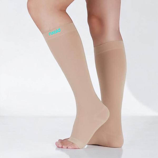 Smartly controls Varicose veins and empowers your recovery.Compression Level- Class 2 (23 - 32mmHg)Length- Knee LengthToe Style- Open ToeColour- BeigeQuantity- One PairSilent Features-Improve circulation and drainage to treat Varicose VeinsHighest compression stockings made of lycra and polyamideLow elastane material for a soft and comfortable fit Perfect for wearing over long periods of timeBenefits-help to manage the symptoms of lymphoedemaImprove circulation and drainage Features DUOFIT technology for easier applicationNo left or right stocking - both can be worn on either foot for easy use Reduced elastane for a soft feeling and more comfortable fitExtend up the whole thigh for warmth and securityPerfect for use over long periods of timeRecommended for-Tired aching legsOedemaChronic Veins insufficiencyVaricose veinsTo prevention of varicose veinsDeep Vein ThrombosisLymphedemaLipodermatoslerosisVaricose vein during pregnancyPhlebitisVenous thromboembolism