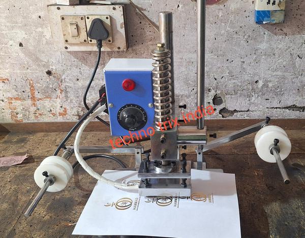 USAGE :- FOR HOT FOIL PRINTING & EMBOSSING ON LEATHER, PAPER, REXINE, WOOD, COATED METAL AND GLASS ,PLASTIC BOX (JEWELLERY BOX, OPTICAL BOX ETC). SPECIFICATIONS :-HEATING PLATE SIZE 4 INCH X 2 INCH (CAN PRINT UPTO 4 INCH X 2INCH PRINT).WORKING HEIGHT - 1 MM - 200 MM (ADJUSTABLE).HEATER POWER – 250 WATT (CARTAGE TYPE HEATER EASY TO CHANGE WITH IN A MIN).POWER SUPPLY – 230 VOLT 50-60 Hz(CAN BE USE AT HOME ALSO).BASE PLATE SIZE 10 INCH X 8 INCH, SLIDING BASE PLATE. PID CONTROLLER FOR ACCURATE HEAT CONTROLLING (AVOID OVERHEAT).BOTH SIDE FOIL LOADER AND UNLOADER HOLDER.HEAVY MACHINE STRUCTURE WITH CHROME COATED.1 YEARS ELECTRIC PARTS WARRANTY.WE ALSO SUPPLY DIE BLOCK AND HOT FOIL ROLL.