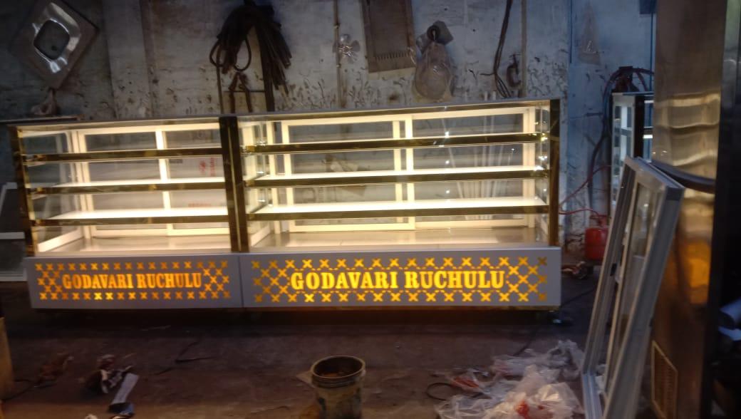 With the constant support of our dexterous workforce, we are able to come up with high quality Sweet Display Counters. These counters are manufactured using best grade glasses and other products. These products are manufactured under the guidance of our skilled professionals to maintain a standard quality. Our products are available in various sizes and colors.