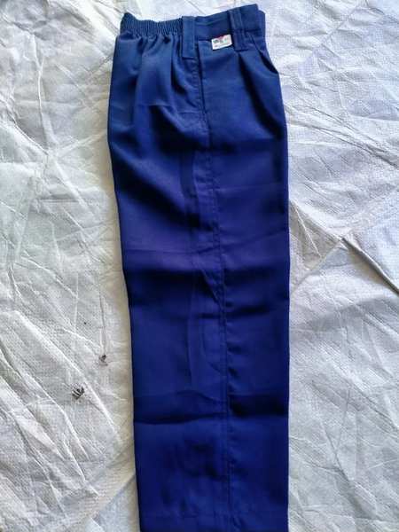 SCHOOL TROUSER MANUFACTURER IN AHMEDABADAmit Uniform is a leading manufacturer of high-quality school trousers, designed for durability, comfort, and a professional appearance. Our school trousers are crafted from premium fabrics that are easy to maintain and long-lasting, ensuring they withstand daily wear and tear. With a focus on fit and practicality, our designs include adjustable waistbands and reinforced stitching to provide comfort and longevity. Available in various colors and sizes, Amit Uniform ensures that every student looks smart and feels comfortable throughout the school day.