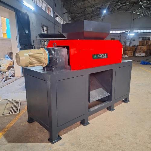 Double Shaft Car battery plate shredder 500kg/hr In Coimbatore | Craft ShreddersThe CDH - 6022 Double-shaft shredder is ideal for processing almost all Light metal and battery plate as well as hard and resistant materials. These machines can shred cable small drums,building blocks,and even sheets, automotive parts, blow molded materials,medium-size commercial scrap, canisters, buckets, and light metals. Different configurations ensure optimum adaptation to every application. The shredder can also be ideally integrated into a two-stage solution.Flexible control for changing material flowsCRAFT only requires one control panel to precisely control one or more machines including the conveyor system. The built-in CG PLC control is optimally adapted to the shredding process. Various slide controls and rotor settings can be conveniently adjusted to the desired application. All control cabinets are designed in-house and built in our INDIA production facilities.echnical specificationsBased on the principle of speed and high torque, double shaft shredder are extremely versatile shredders that are designed to bulky material. They are easy to operate and requir minimal supervision. being significantly rugged with a strong support structure, these shredders are noted for their performance, durability,and realibility and are ideal for challenging applications.Pre shredderIncludes rotary shear (double shaft shear)which cuts and crushes voluminous light metal scrap like automobile light body, paint drum with goods body,etc into small pieces. it has two rotors driven by motors and gearoxes and can bear abnormal load conditions and pre-shred without causing significant noise or polluting the air. Shredder Chassis designThe whole chassis is made of welded steel plate and finely machined by vmc gantry milling which has high bearing capacity high impact resistance and more stable quality. Rotor bearings Protect against dust and foreign matterThe shredding of particularly resistant materials requires correspondingly robust bearings that are easy to maintain. CRAFT uses long-life, spherical roller bearings, Their additional shaft seal ring effectively helps against the intrusion of contaminants or dust.Shredder SpindleThe Shredder spindle is made of high alloy,forged and heat-treated and tempered as a whole,and then machined into hexagonal,octagonal and spline form by cnc gantry milling after fine turning, with long sevice life.Robust drive with planrtary gearbox For most applications, electromechanical drives are the classic choice because they are easy to maintain and robust special :manufacture brandad gearboxes that are specially designed for shredding operations. Torque monitoring and shock-absorbing vibration dampers round off the package. A hydrodynamic start-up clutch is available as an option for further protection of the machine.In stock Guarantee We carry a complete line of replacement parts for all CRAFT Equipments with shipping on standard parts within 24 hours We also provide field service Technicians support if your equipment needs maintenance or repairs. Depending on location,our technicians can generally be on your site within 24 hours.