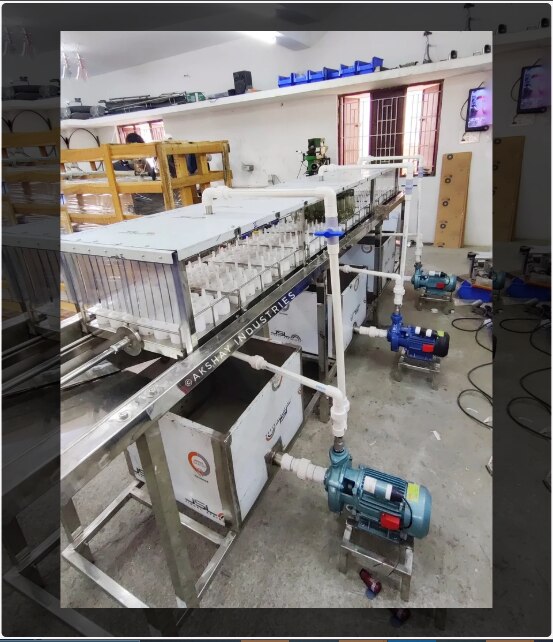 Three Stage Goli Soda Rinsing Machine Manufacturers in Coimbatore, Tamilnadu, South India.Three stage goli soda rinsing machine - 3 NOS - 1 HP Pump / SS Storage tank / SS Net attached at the top of storage tank / Heater attached at final process tank /Pneumatic cylinder is attached in the machine for transferring the bottle holding tray / Inner and outer will be rinsed / Goli soda bottles from 200 to 300 ml can be rinsed / Air Compressor is needed for actuation