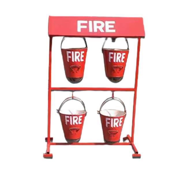 Fire Bucket Stand Manufacturers & Suppliers  in Ahmedabad, Gujarat, India.Description:This Four Bucket Fire Fighting Stand is built from Mild Steel and designed to hold up to 4 fire buckets filled with sand or water. It's perfect for quick access during a fire emergency. The red color ensures high visibility, and the stand can be customized in terms of bucket size and thickness to meet specific needs.No canopy is included, but we can customize the design based on your requirements.Key Features:Durable Mild Steel constructionCustomizable size and thicknessComplementary buckets availablePaintable for added protectionBest for: Fire safety in industrial, commercial, and public spaces.Call Us For More Information.